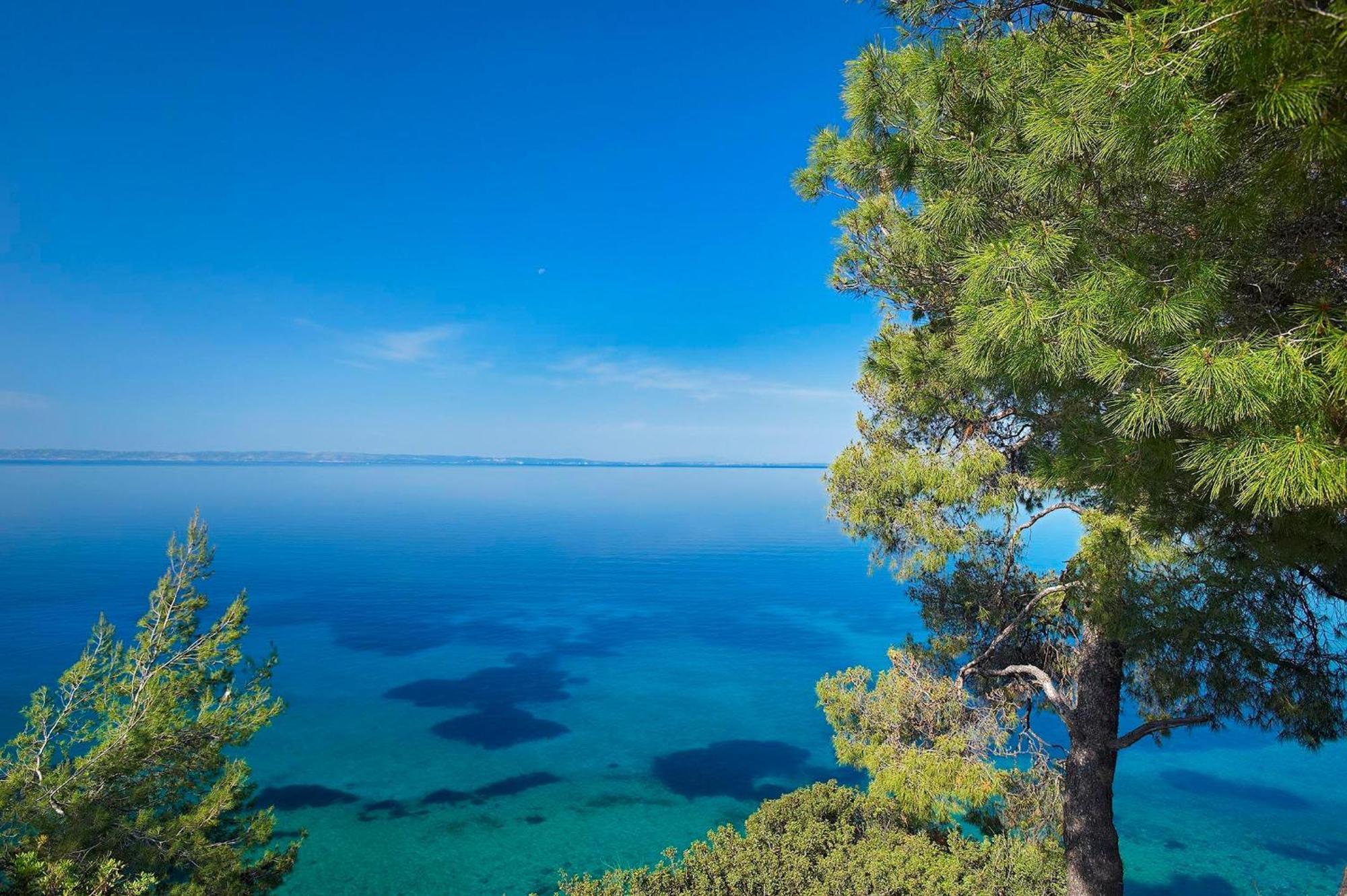 Отель Ikos Oceania Неа-Муданья Экстерьер фото