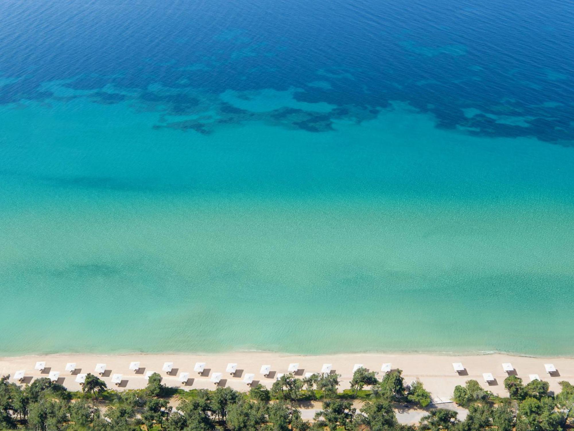 Отель Ikos Oceania Неа-Муданья Экстерьер фото